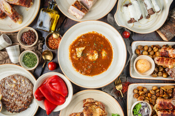 Table Full of Food: An image capturing a bountiful spread of various dishes arranged on a table,...