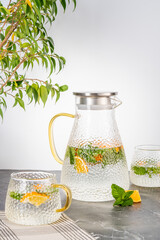 Transparent jug with lemonade