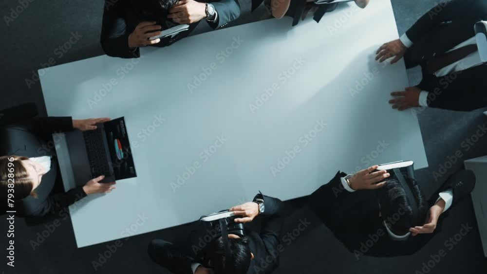 Poster top down aerial view of diverse data analysts wearing vr headset and stand around table while using 