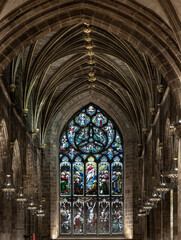 Beautiful Glass stained window inside of The thistle chapel in St Giles' Cathedral or the High Kirk. The most important place of worship in the Edinburgh, Space for text, Selective focus.