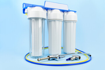 Set three of cartridges for water filter with clear glass of water. Concept of water treatment...