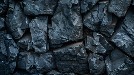 Coal wall Black gray rock texture with Dark gray coal stone granite background for design. Rough cracked mountain surface. Close-up ,detail of coal texture and patterns for a background image
