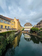 Urban medieval landscape of Alsace, water canal Colmar, France. 