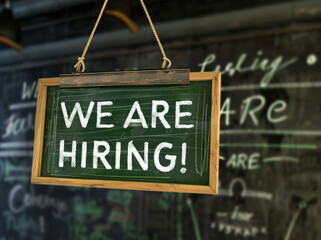 We are hiring sign hanging on wall - 793865804