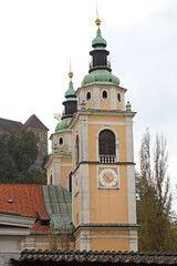 Clock at Bell Tower at Cathedral in Ljubljana Slovenia Rainy Day