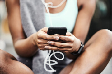 Hands, exercise and woman with smartphone, fitness and listen to music with break, relax and contact. Closeup, person or girl with cellphone, mobile user and connection with workout or check progress