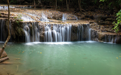 Obraz premium Waterfall along a tropical river in Thailand
