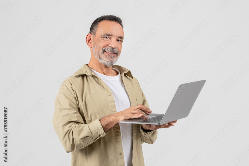 Poster man holding laptop computer on white background