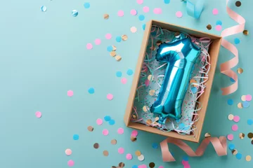  First birthday gift box with number 1 balloon inside, confetti and ribbons on a pastel background © ink drop