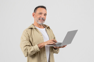 Man Holding Laptop Computer On White Background