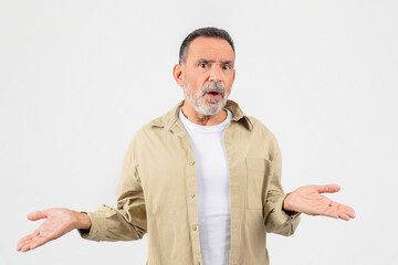 Man Standing With Hands Outstretched, Feeling Confused