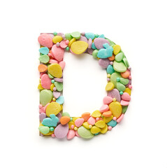 Capital letter is made of candies in the shape of Easter eggs on a white background.