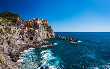 Fototapeta na wymiar Magic of the Cinque Terre. Timeless images. Manarola, a dream village overlooking the sea