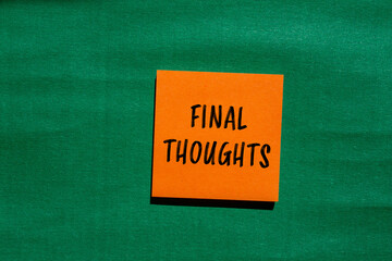 Final thoughts words written on orange paper piece with green background. Conceptual final thoughts symbol. Copy space.
