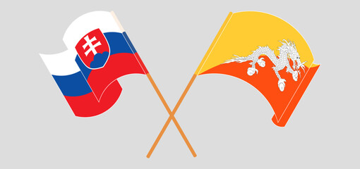 Crossed and waving flags of Slovakia and Bhutan