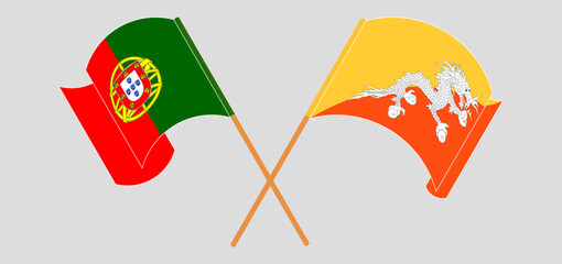 Crossed and waving flags of Portugal and Bhutan