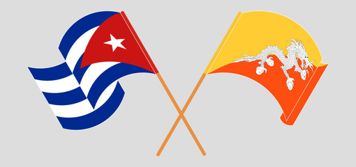 Crossed and waving flags of Cuba and Bhutan