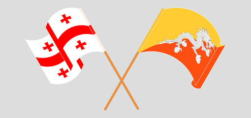Crossed and waving flags of Georgia and Bhutan
