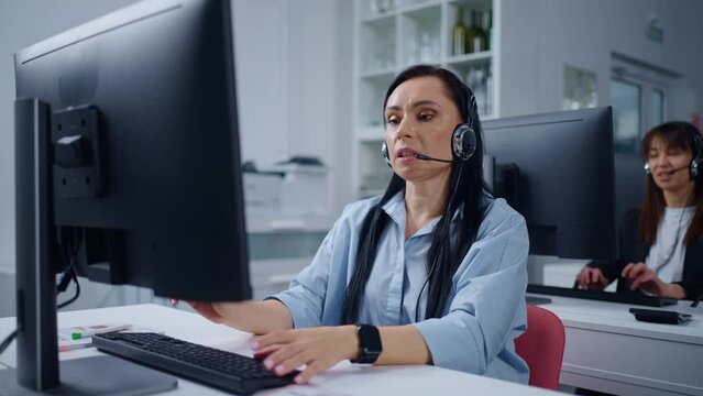Woman Working In Telemarketing Department, Portrait Of Brunette Lady With Headset In Office