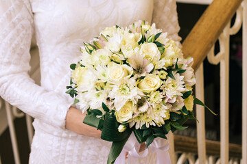 bride holding wedding bouquet