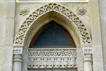 Fototapeta premium Fragment of decoration on the building of the Yildiz Clock Tower, built in front of the Hamidiye Mosque in Istanbul.