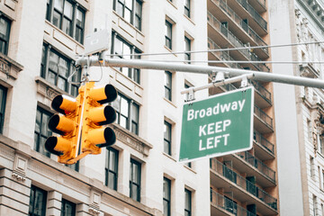 Broadway road sign on the side of the street in Manhattan - New York City.