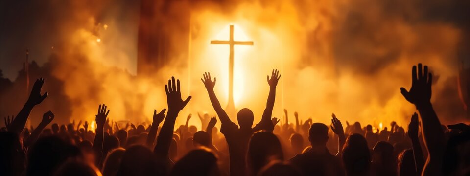 Happy Easter concept. Christian worship with raised hand in front of the cross background.