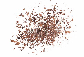 Pile chopped, milled dark chocolate isolated on white, top view