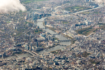 High aerial view of downtown city of London, with river Thames, the Shard, Tower bridge, HMS...