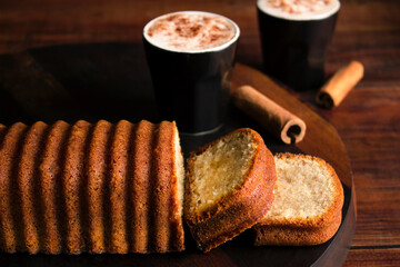 Freshly Baked Bread with Coffee and Milk. Indulge in the simple pleasures of life with a slice of...