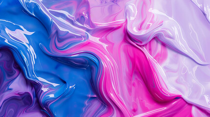 Closeup view of a swirling pattern of purple and pink paint