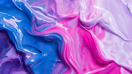 Fototapeta premium Closeup view of a swirling pattern of purple and pink paint