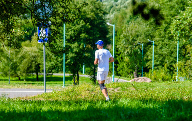 A man Jogging in a summer Park
