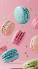 Pastel coloured french macarons levitating in the air, pink background