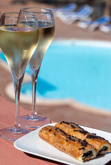 Glasses of sparkling wine cava or  champagne with chocolate cakes, romantic event on all inclusive...