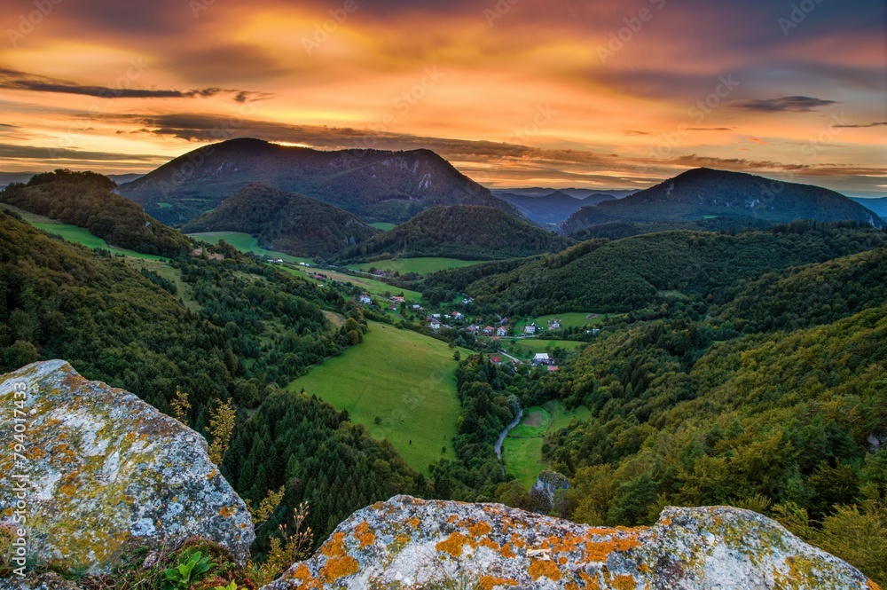 Poster Colorful sky, fantastic evening.  Picturesque and gorgeous evening scene on a rock overlooking the hills.. Beauty world.