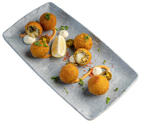 Cheese and jalapeno cheese bombs dusted in special masala served with cheese sauce and peri peri mayo
