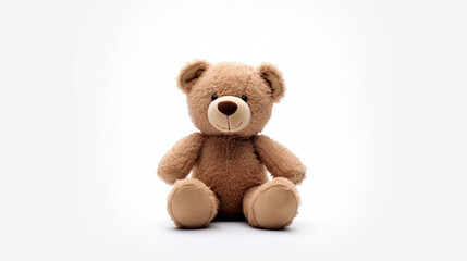 A lone teddy bear toy against a stark white background
