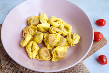 Ravioli with mozzarella and tomato