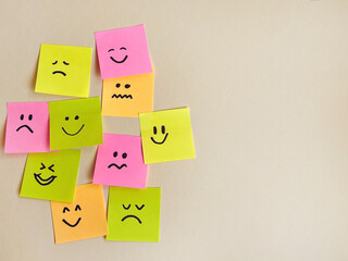 Many sticky notes with different sad and happy emotions  . Survey Concept  