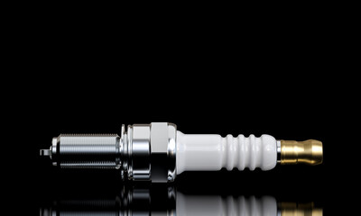 High-quality image of a spark plug isolated on a reflective black surface - 794067208