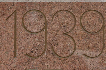 1939 on a marble wall