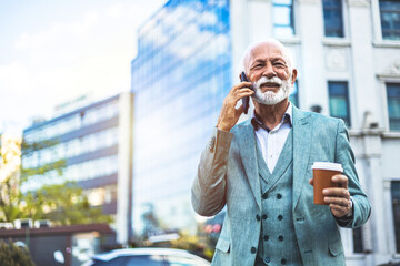 Business, phone call and old man in a city, smile and communication with planning, talking and network. Senior person, employee and outdoor with entrepreneur, cellphone and contact with conversation.