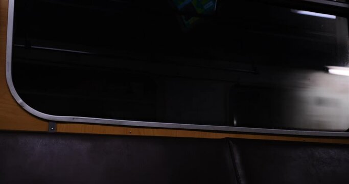 Traveling by train in tunnel. the view on the tunnel from inside the subway train through the window raiding