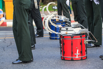 Red  Bass Drum are  in Parade waiting for Marching Band to perform