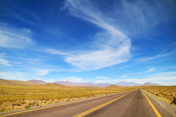 Fototapeta na wymiar Empty Desert Road in the Los Flamencos National Reserve, Antofagasta Region, Northern Chile, South America