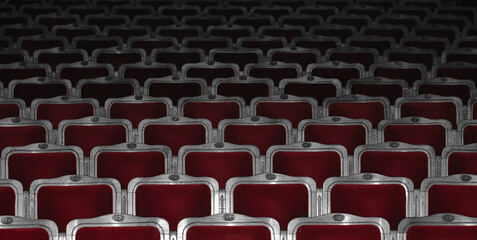 Row of red seats in theatre