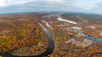 Aerial autumn fish-eye panorama of colorful river dale with woods in scenic countryside