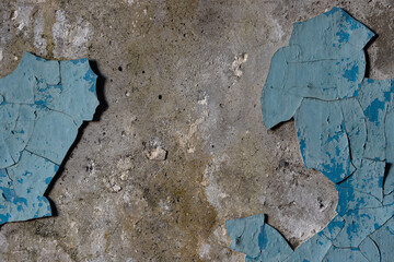 Blue peeling paint on the wall. Old concrete wall with cracked flaking paint. Weathered rough painted surface with patterns of cracks and peeling. High resolution texture for background and design. - 794086039