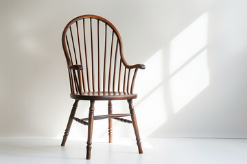 elegant photo capturing the timeless appeal of a Windsor chair in a contemporary setting, featured against a white background, emphasizing its versatility and classic design in mod